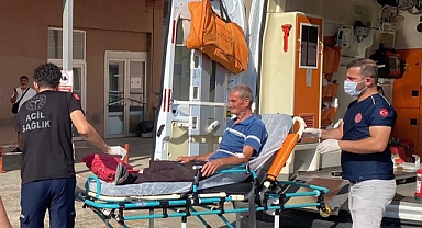 Testere ile tahta keserken kendisini yaraladı