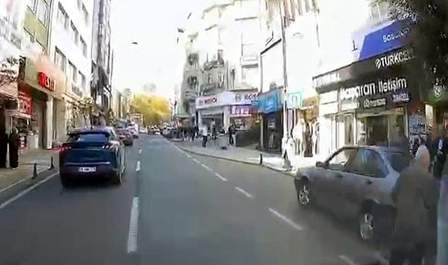 Otomobilin altında kalmaktan son anda kurtuldu; o anlar kamerada